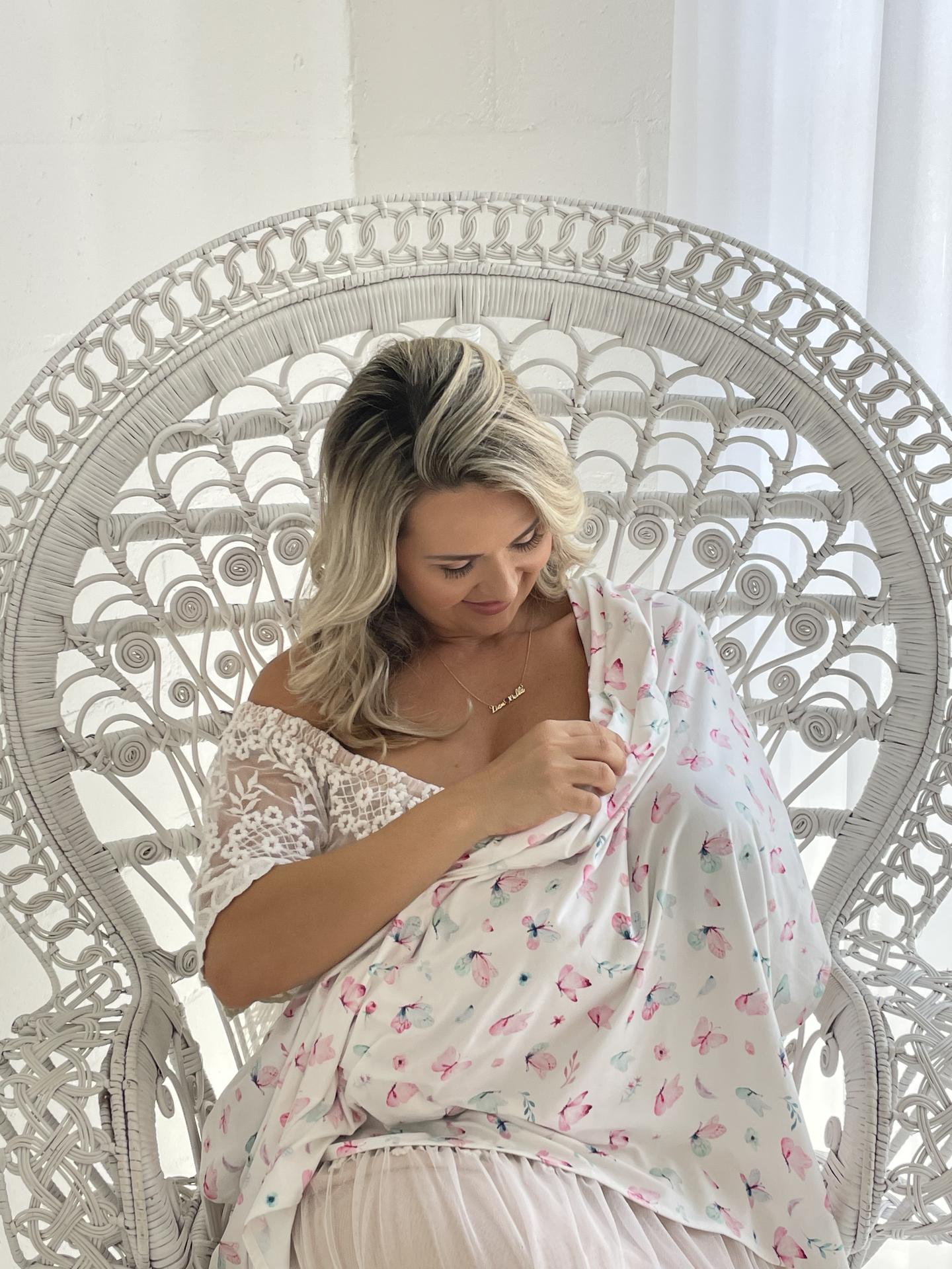 Swaddle draped as a nursing cover