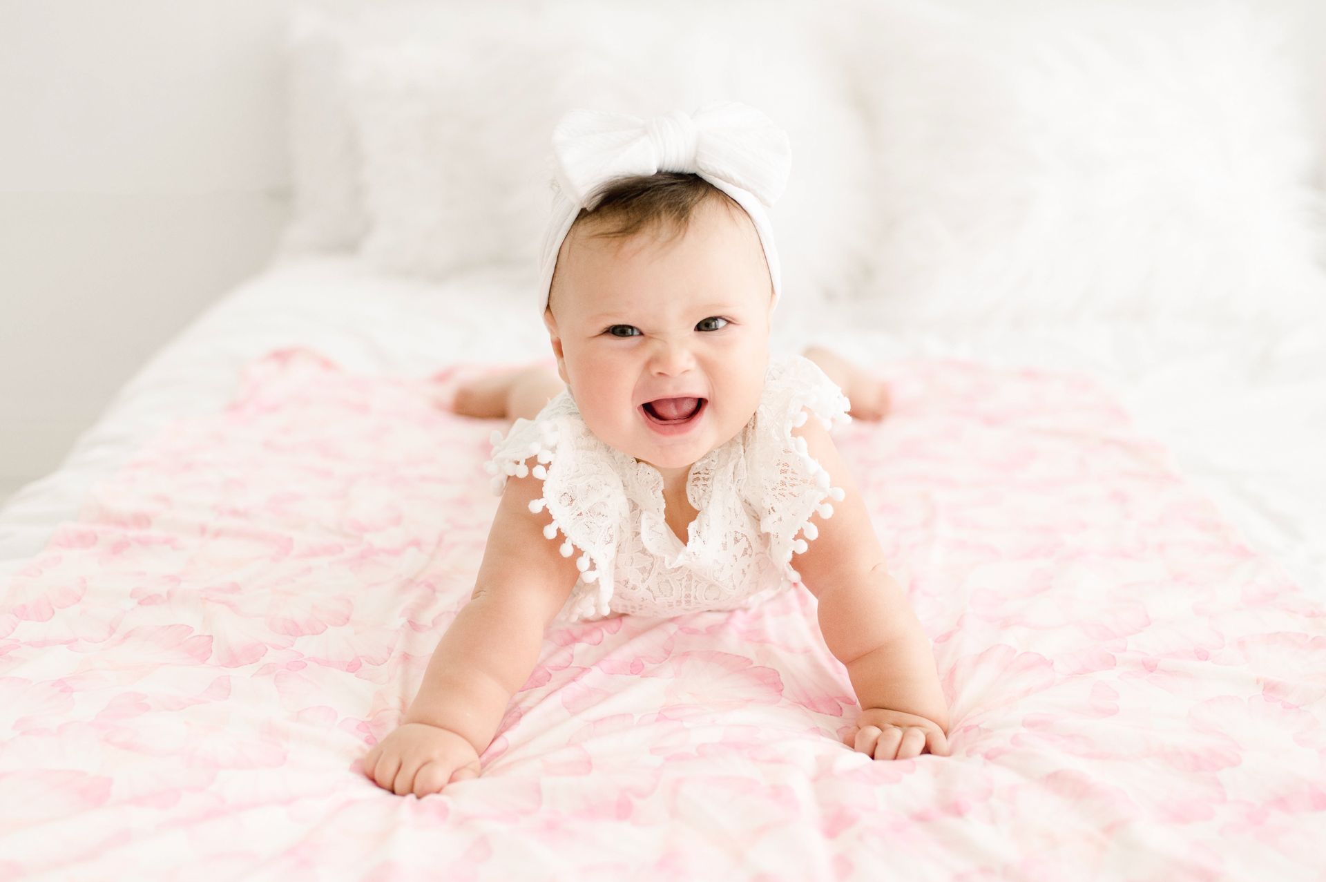 Baby on a swaddle spread out for tummy time