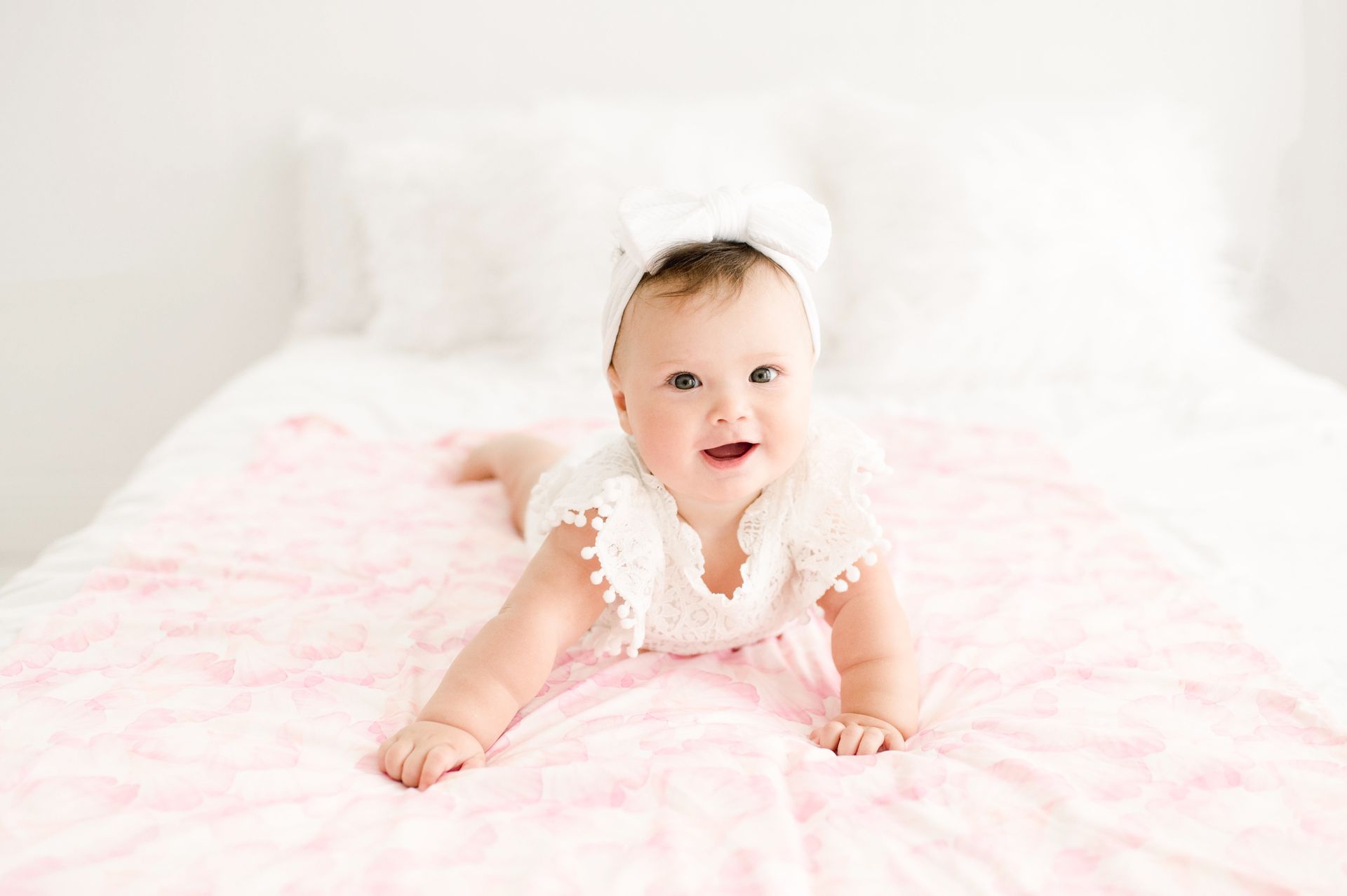 Baby on a swaddle spread out for tummy time
